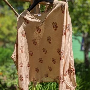 100% silk top with bat-type sleeves (set in)